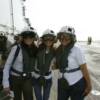 Frieda Garcia interpreting during a tour through the USS BOXER for President Saca